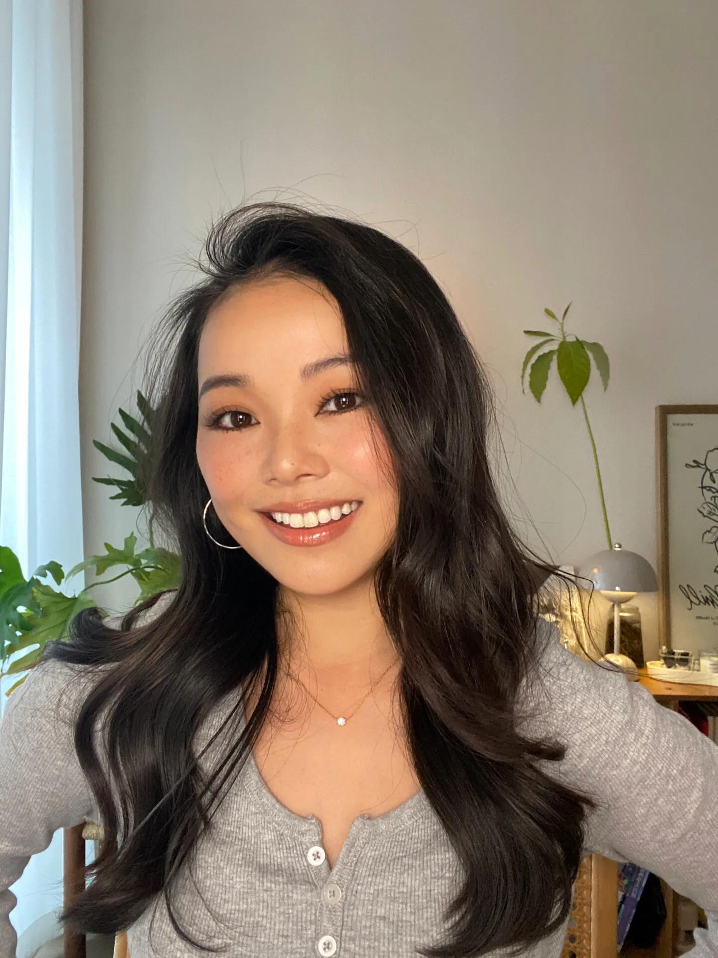 Cristina smiling at home
